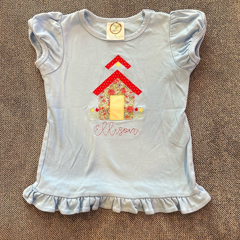 Embroidered school house shirt with name Ellison